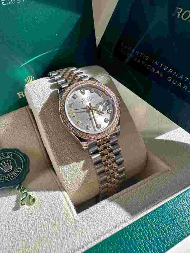 Rolex Datejust 31
                           
                                 NEW 2024 Silver Diamond Dial Diamond Bezel Two Tone Yellow Gold Jubilee