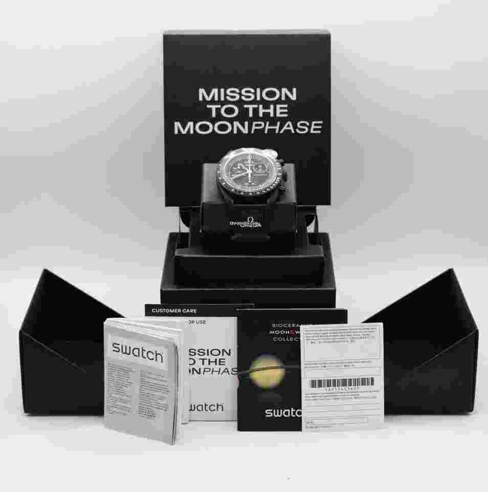 Swatch Moonswatch
                           
                                 Black "Snoopy" Moonswatch Mission to the Moonphase