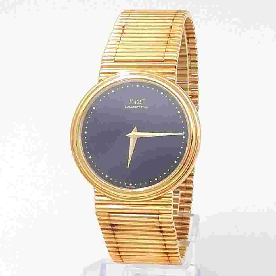 Piaget
Vintage 32mm Yellow Gold - Black Dial - Bracelet 7632 G 1