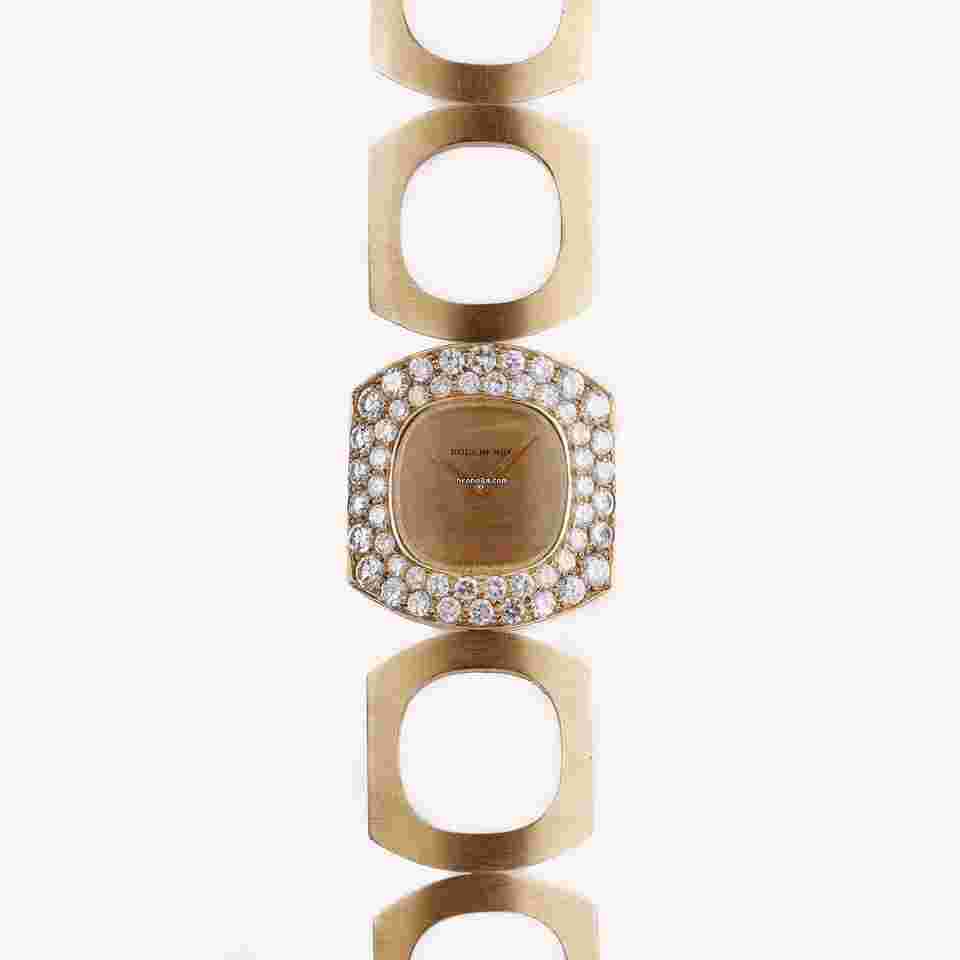 Boucheron
                           
                                 Vintage Lady's Wristwatch | Circa 1970s | Champagne Dial | Double Row Diamond Bezel | 18k Yellow Gold