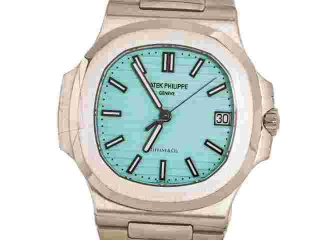 Patek Philippe Nautilus
                           
                                 TIFFANY & CO Ref 5711-1A Stainless Steel TURQUOISE Dial Box Papers Bj-2021 UNWORN 19% VAT Included