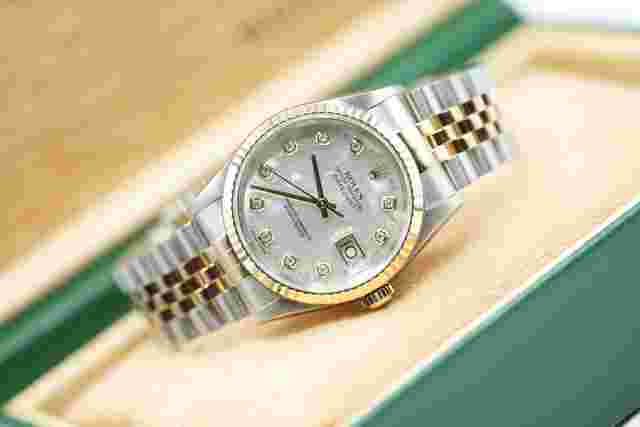 Rolex Datejust 36
                           
                                 Steel And Gold Datejust 36 16233 Factory White Mother of Pearl Dial Box Papers