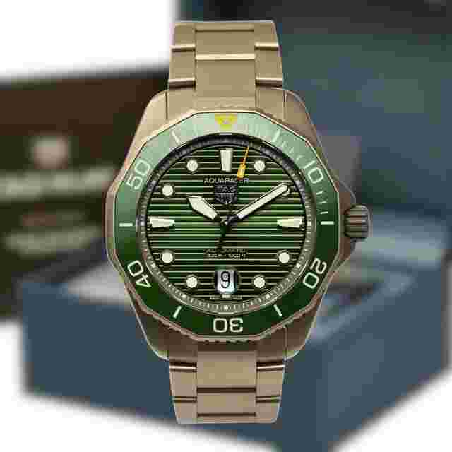 TAG Heuer Aquaracer 300M
                           
                                 FULL SET - LIKE NEW WATCH Aquaracer 300M Professional WBP208B Green Dial Titanium