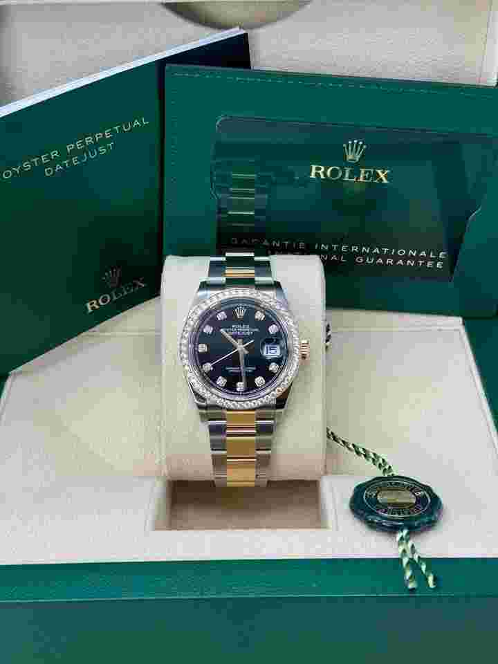 Rolex Datejust 36
                           
                                 NEW 2023 Black Diamond Dial Diamond Bezel Two Tone Yellow Gold Oyster