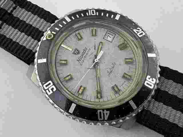 Nivada
                           
                                 87007 Electronic Antarctic Gray Dial Cal ESA 9154 - READ - 35 mm