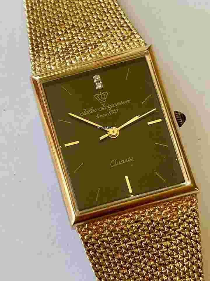 Jules Jürgensen
                           
                                 Rectangular Gold Capped Genuine Diamond Black Dial Blue Sapphire Crown Vintage Swiss Made