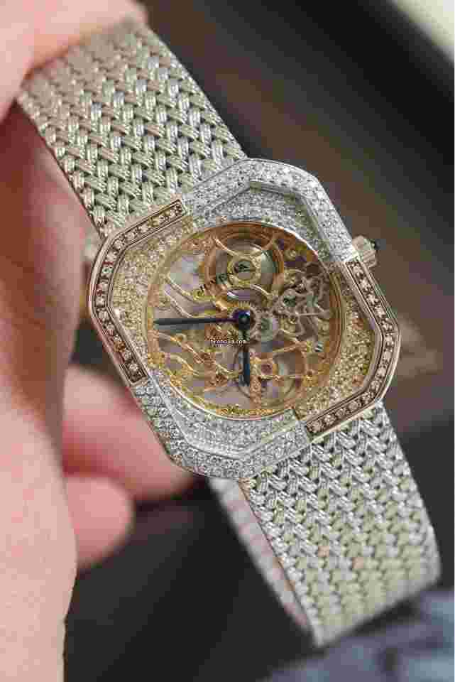 Juvenia
                           
                                 Diamond white gold hollow mechanical watch 29X30MM
