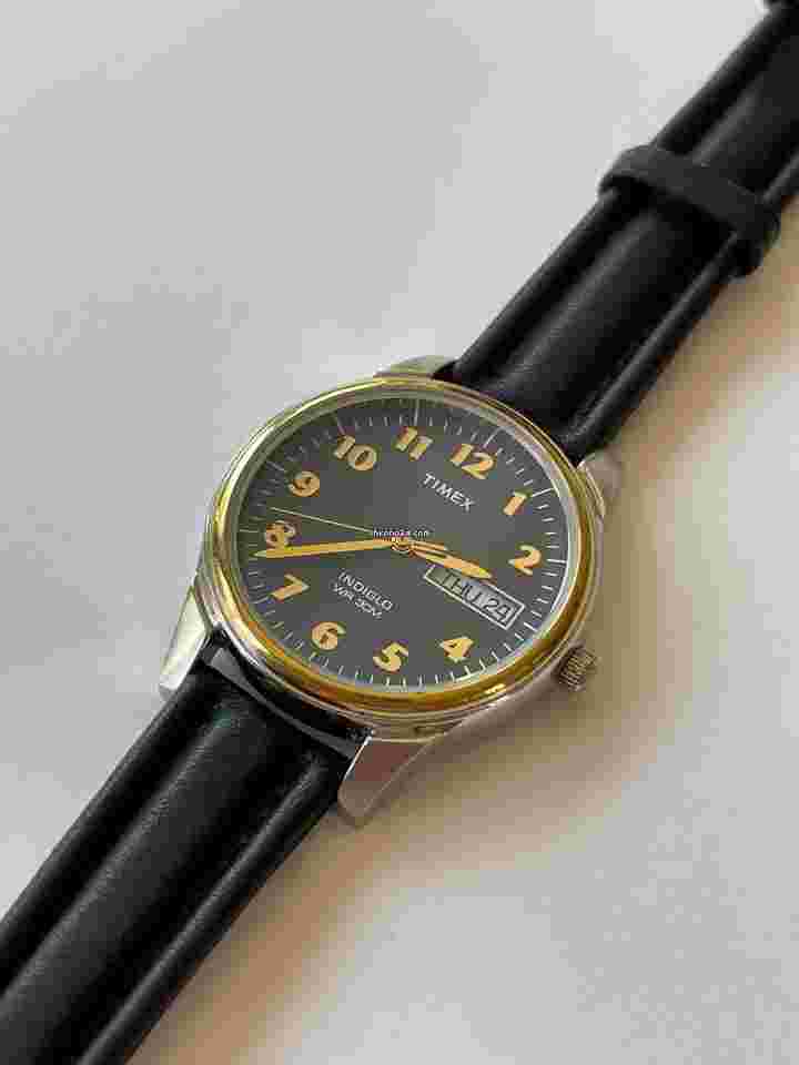 Timex
Indiglo WR30M Two Tone Gold Stainless Steel Day Date Black Dial Gold Numbers Vintage
