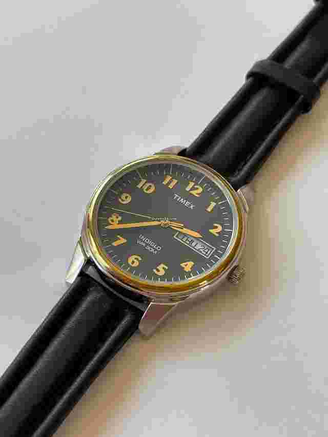 Timex
                           
                                 Indiglo WR30M Two Tone Gold Stainless Steel Day Date Black Dial Gold Numbers Vintage