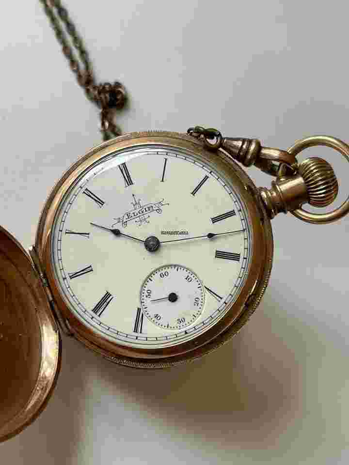 Elgin
Solid 10K Gold Hunter Savonette Antique Pocket Watch White Porcelain Dial Made in USA