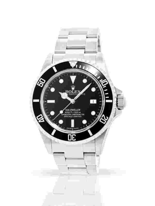 Rolex Sea-Dweller 4000
                           
                                 16600 - Box & Papers - 24-Month Warranty - 2008