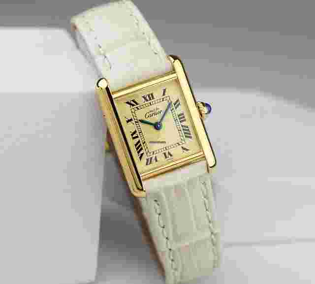 Cartier
                           
                                 Tan Must Roman Ivory Index SM