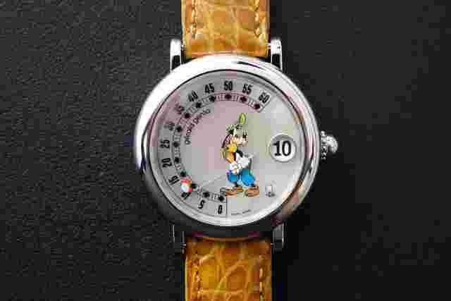 Gérald Genta
                           
                                 Retrograde fantasy MOP Golfer Goofy G.3612 full set