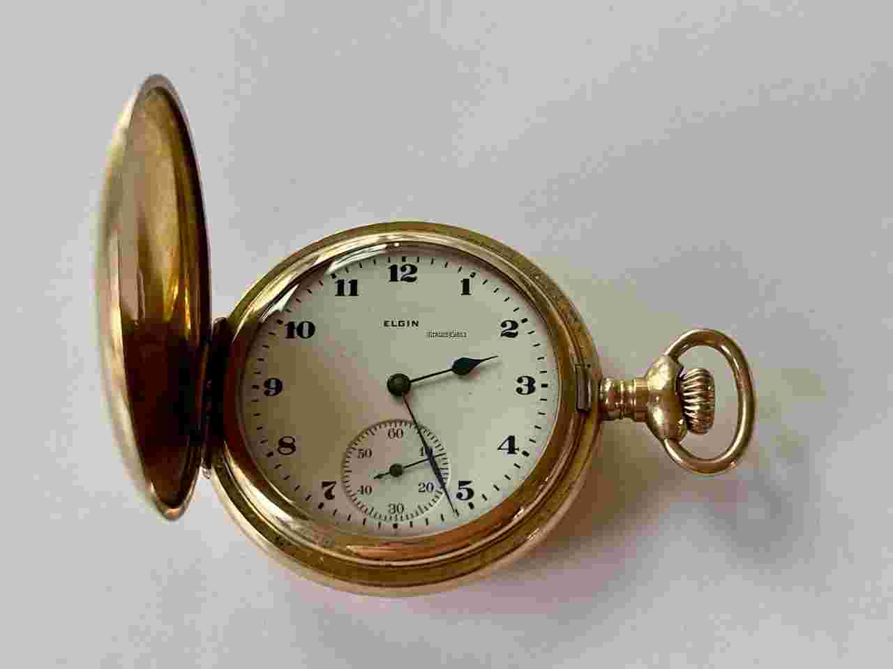 Elgin
Gold Filled White Porcelain Dial Antique Pocket Watch Hunter Case Made in USA