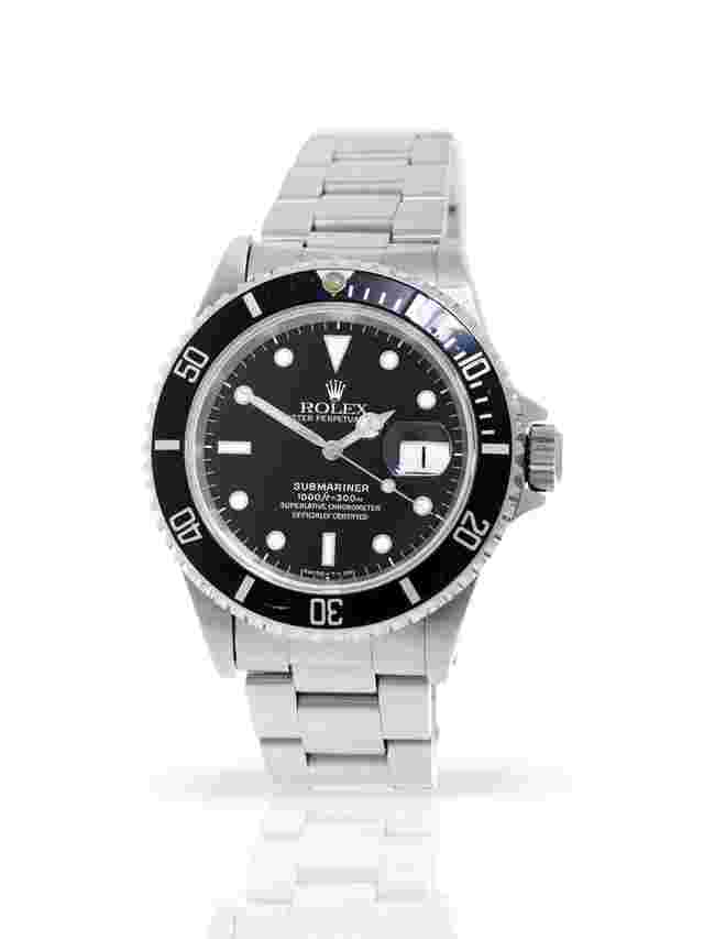 Rolex Submariner Date
                           
                                 16610 - Box & Papers - 24-Month Warranty - 1996