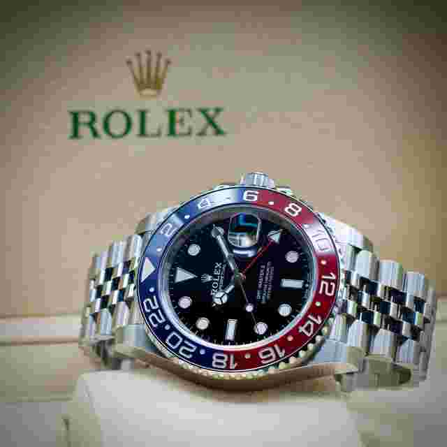 Rolex GMT-Master II
                           
                                 Pepsi on Jubilee Bracelet 126710BLRO Black Dial 40 B & P