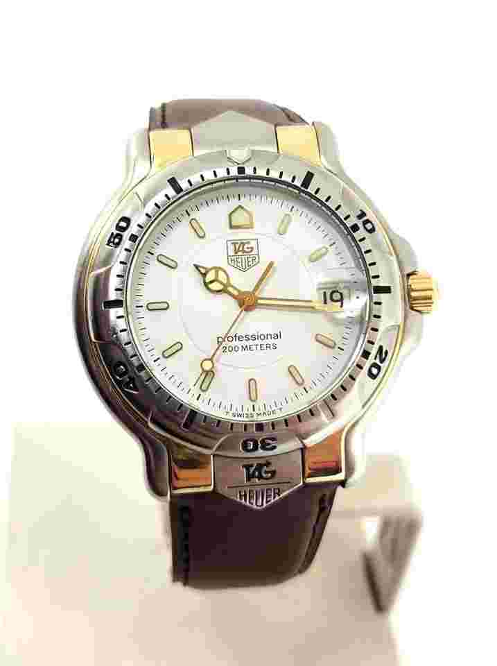TAG Heuer 6000
S/Steel & 18k Mens TAG HEUER 6000 PROFESSIONAL 200m Watch Ref WH1151 EXLNT