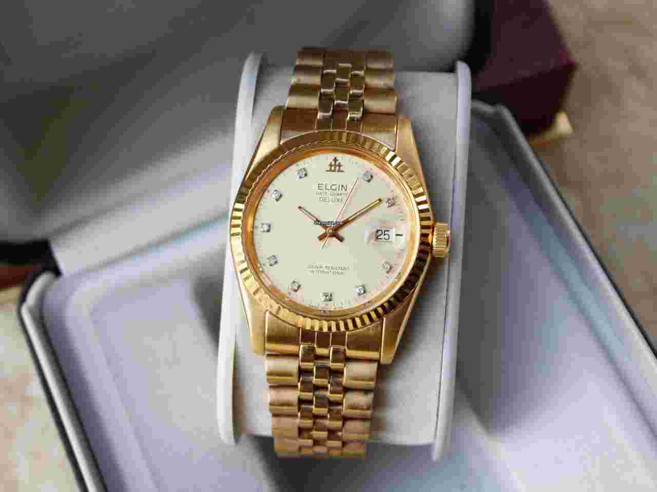 Elgin
Date Quartz De Luxe Presidental Gold/Steel Swiss Cal. D-010