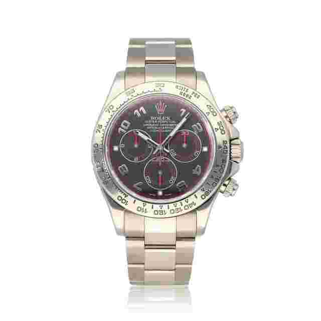 Rolex Daytona
                           
                                 40 chrono white gold black racing dial 2008 box + papers