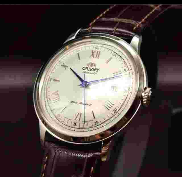Orient Bambino
                           
                                 TAC00009N champagne dial 40.5mm 30m WR automatic men's watch with leather s