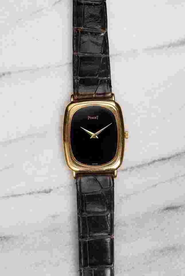 Piaget
Reference 9251 Vintage 1970s Manual Wind 18K Yellow Gold Tank Black Onyx Dial
