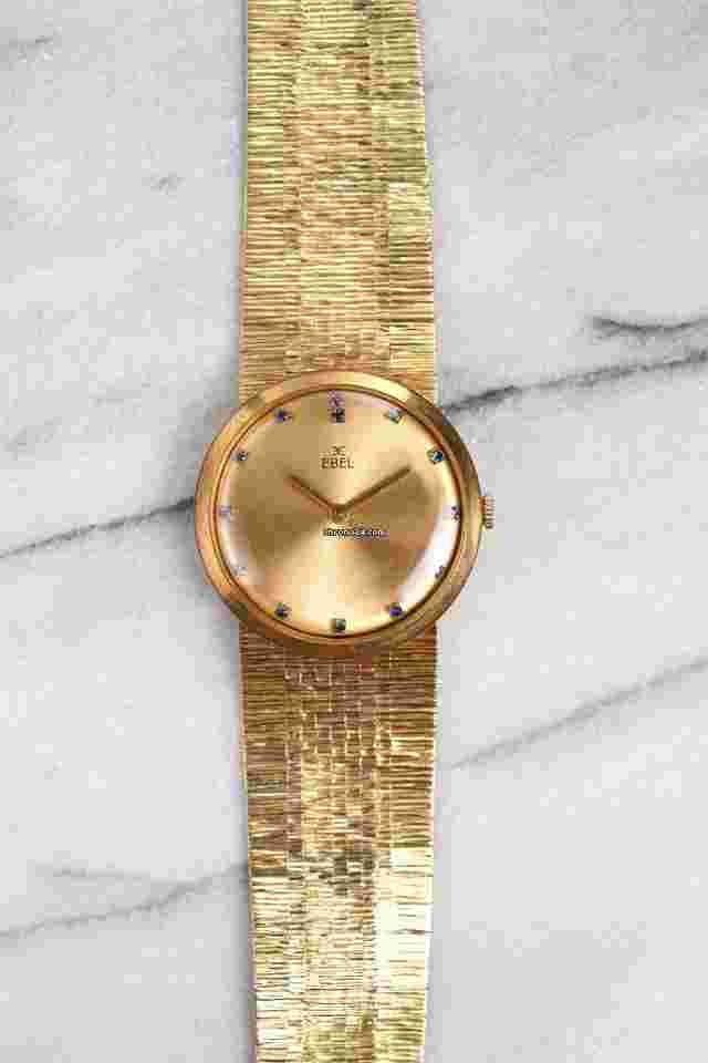 Ebel
Vintage 1970s 18K Yellow Gold Champagne Sapphire Dial Manual Wind 34mm Case