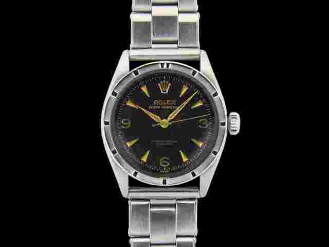Rolex Explorer
                           
                                 Oyster Perpetual 3-6-9 Explorer honeycomb gilt dial - ref . 6165 - very rare dial