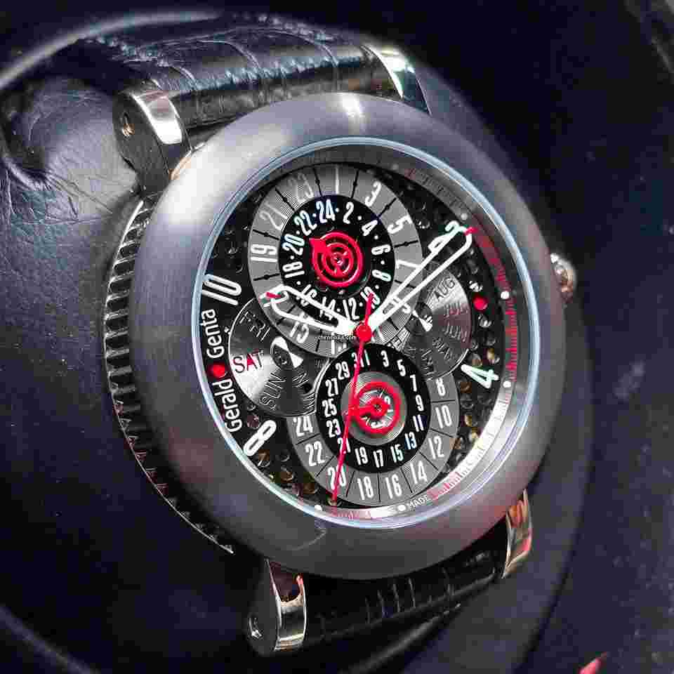 Gérald Genta
                           
                                 Arena Perpetual Calendar GMT white gold and Tantalum full set