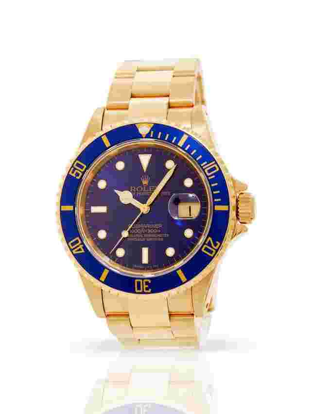 Rolex Submariner Date
                           
                                 16618 Blue - Yellow Gold - With Box - 24-Month Warranty - 1994
