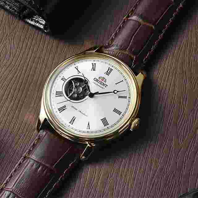 Orient Bambino
                           
                                 automatic watch men's Orient Bambino Open Heart TAG00002W 43mm 50m WR leather strap (hand