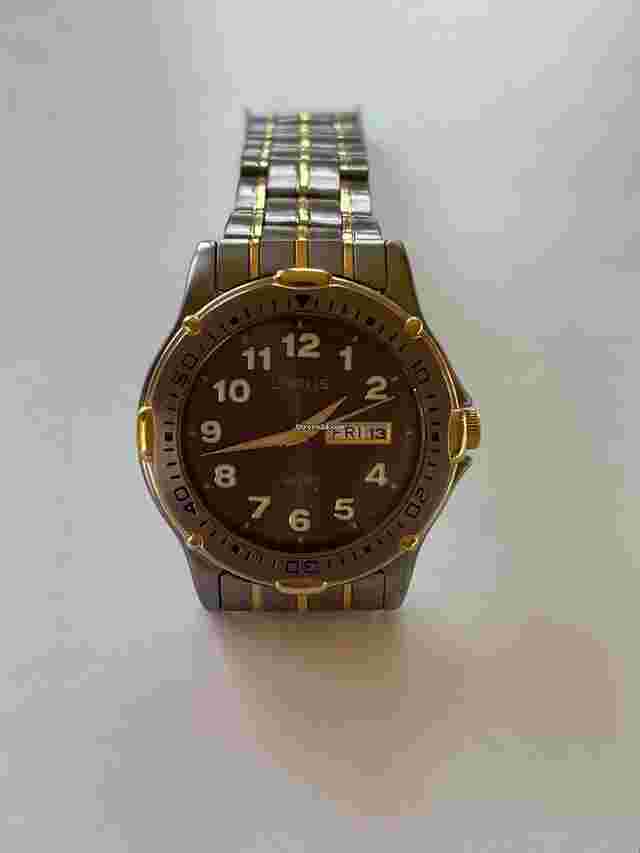 Lorus
                           
                                 100Feet Diver Made by Seiko Calendar Day/Date Two Tone Gold Stainless Steel Vintage Japan