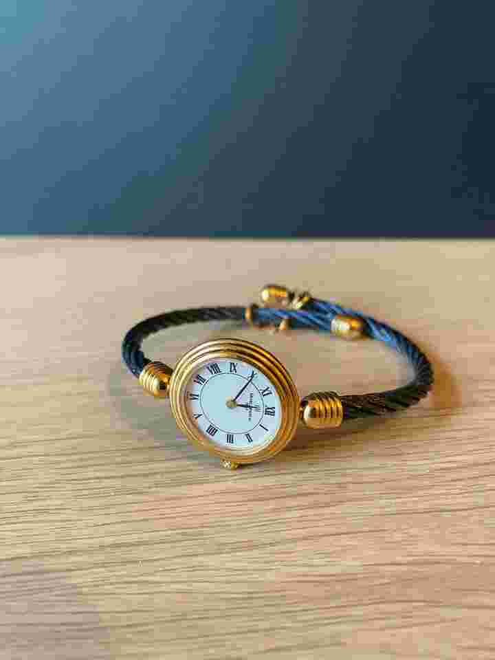Michel Herbelin CBL01 modèle cable quartz pour femme Montre élégante état neuf set complet écrin cuir+certificat