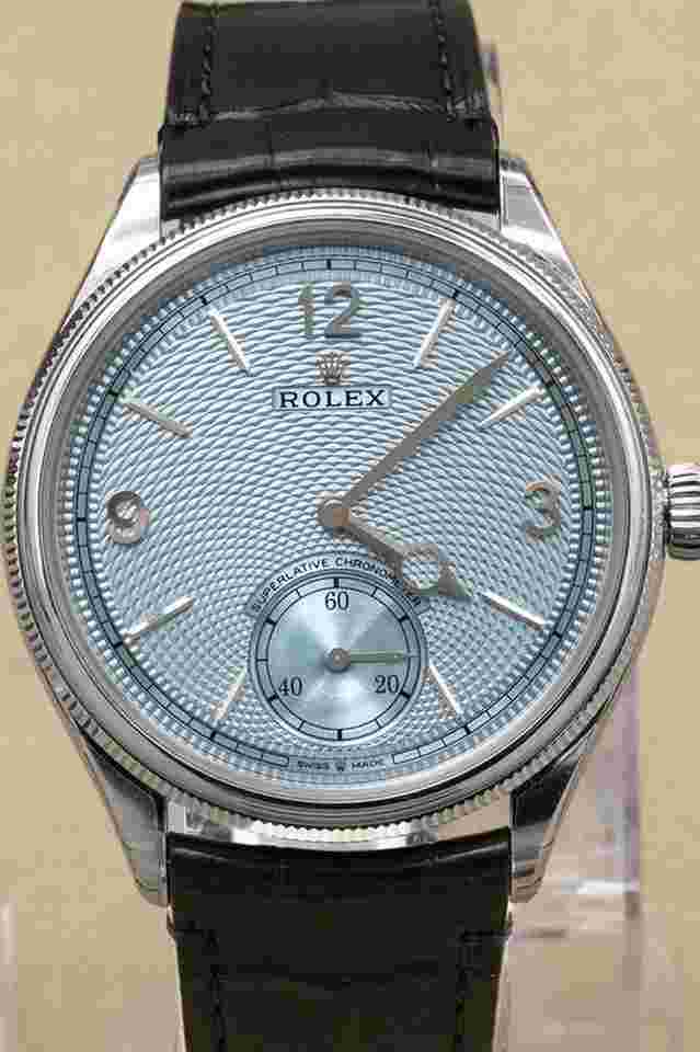 Rolex 1908 2026 Ice Blue Rice-Grain Motif Index Dial on Matt black alligator leather 52506