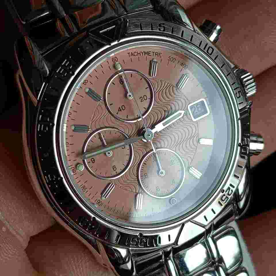 Mondia Zenith Triumph Chronograph - Date Vintage 90 NOS Stunning salmon-colored dial with central workmanship