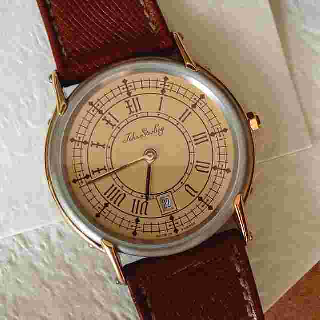 John Sterling Lady Quartz St.Steel/GPl. vintage 85 NOS Champagne dial with black graphics Roman numerals - Date 