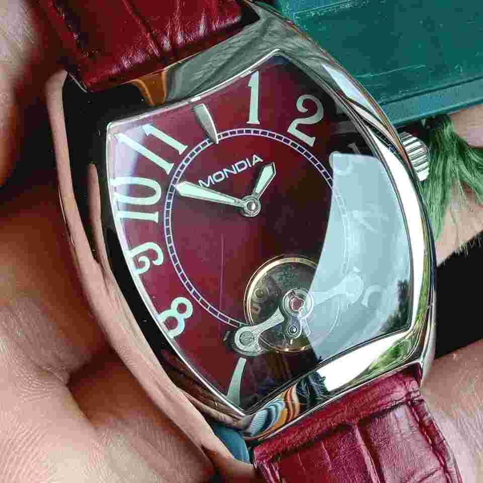 Mondia by Zenith Big Size. St.Steel - Domed case Vintage 90 NOS Full Set Bordeaux dial with Arabic numerals and visible balance wheel