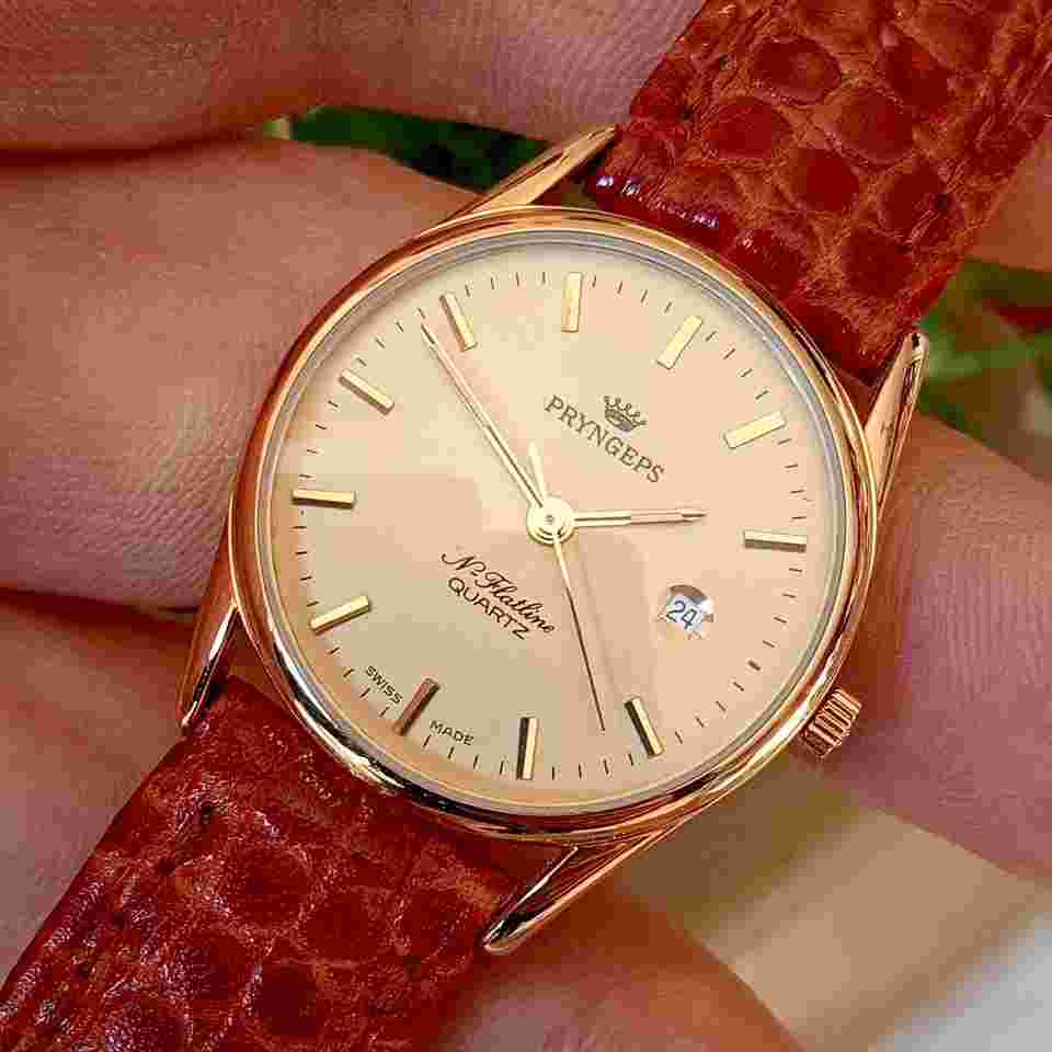Pryngeps N. Flatline Lady Quartz St.Steel/Gold Plated YG Vintage 90 NOS swiss made Champagne dial with applied indexes and date at 3 o'clock.