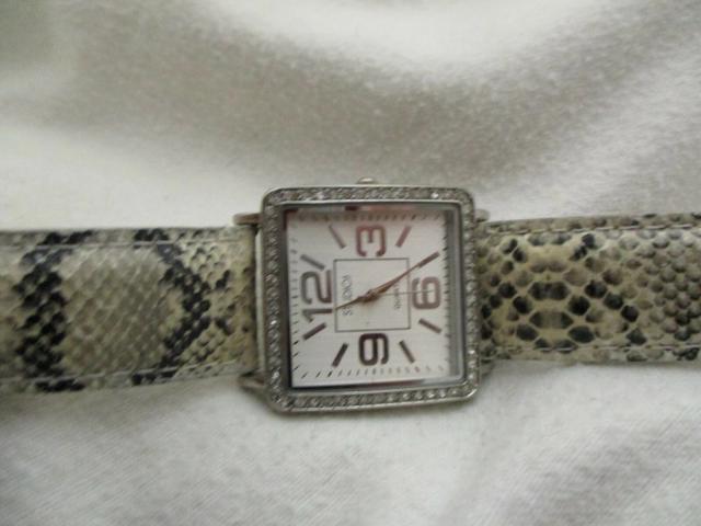 Studio Time Analog Wristwatch with a Buckle Band and Quartz Movement