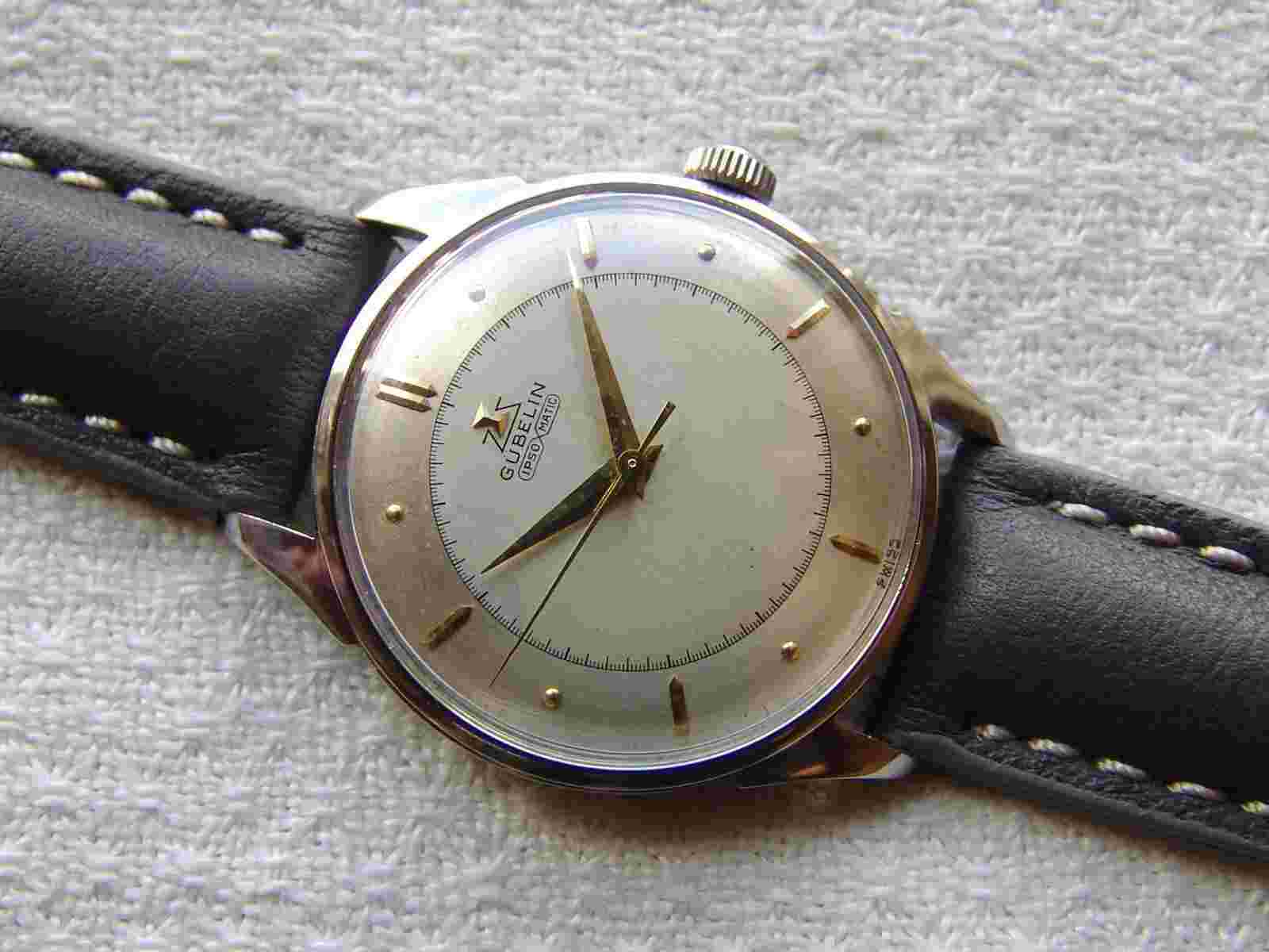 VINTAGE 34 mm WWII ERA men's GUBELIN IPSO MATIC steel WRISTWATCH GOOD CONDITION