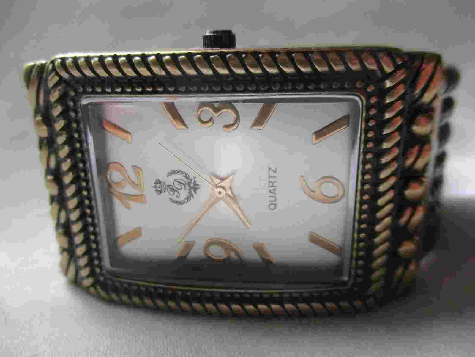 Premier Designs Analog Wriswatch with a Cuff Band and Quartz Movement