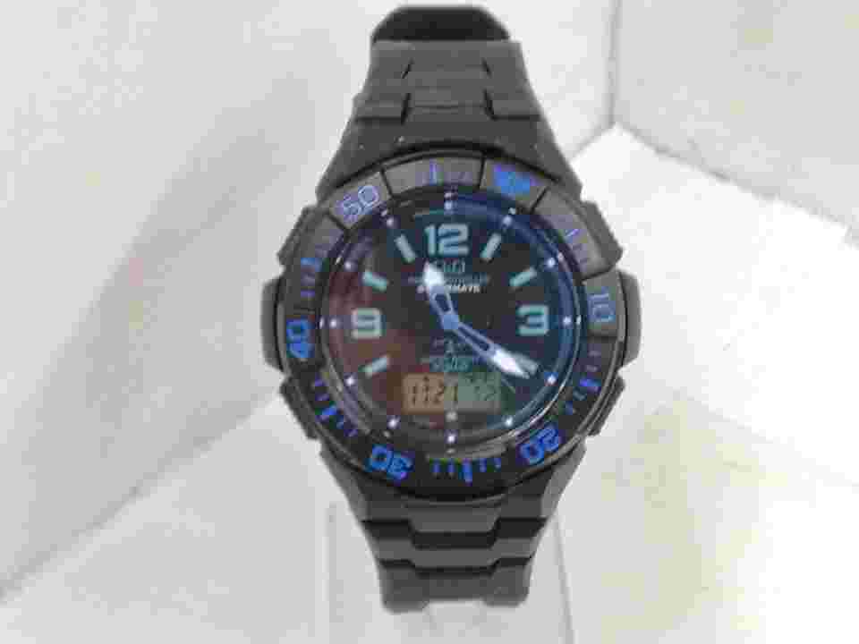 Solar Powered Radio Watch Q Md06-335 Combination Timepiece