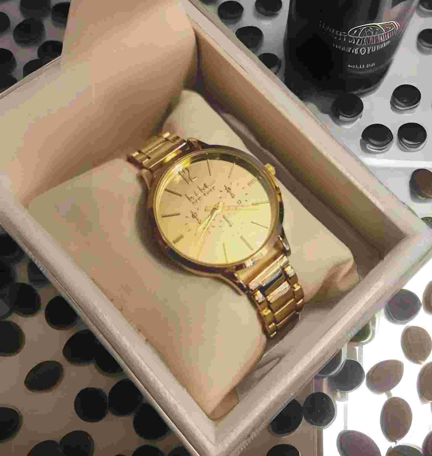 Nicole Miller Womens Watch Analog Gold Tone Round Face Elegant Modern Boss Lady