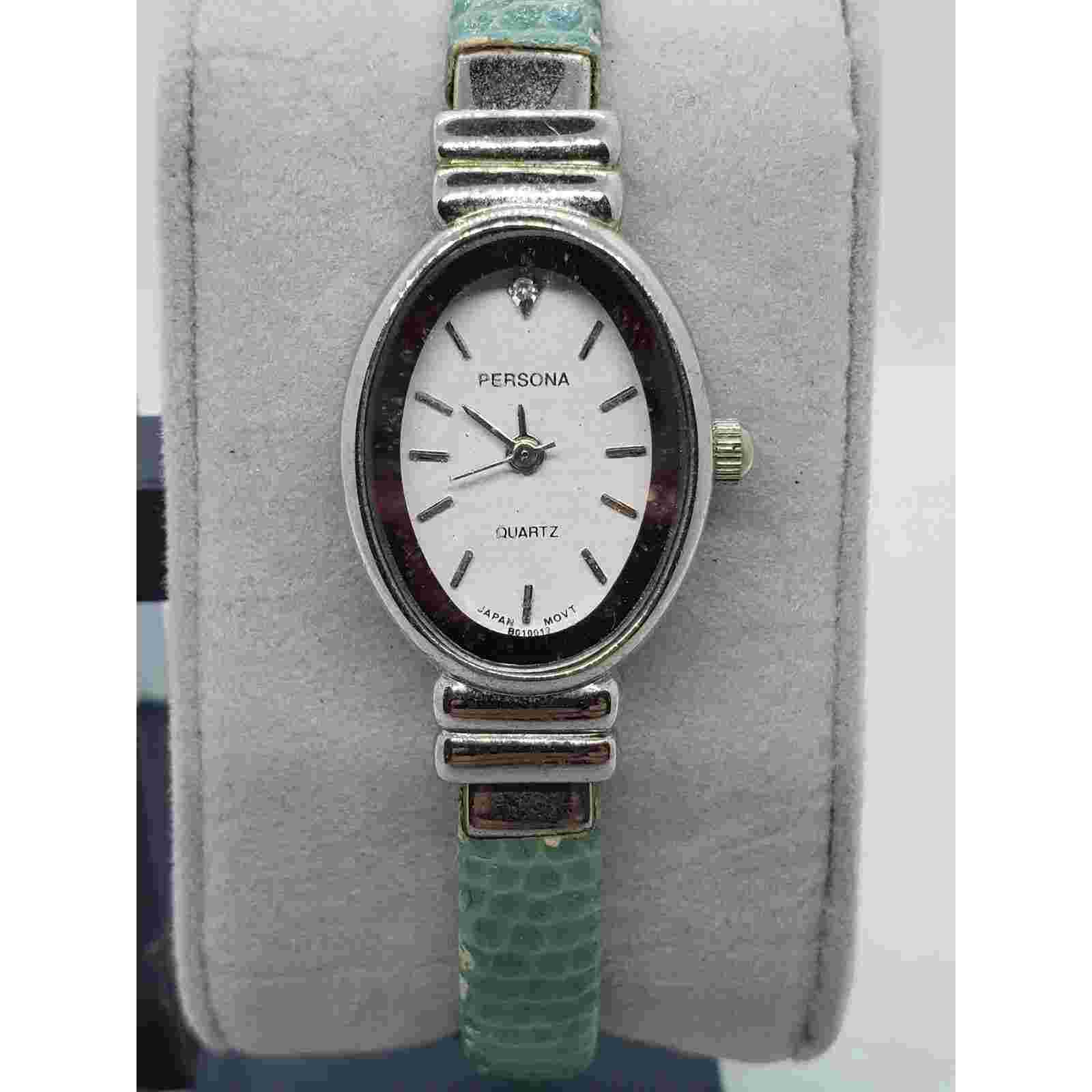 Persona women's watch. Green leather bangle band. Jewel on watch face