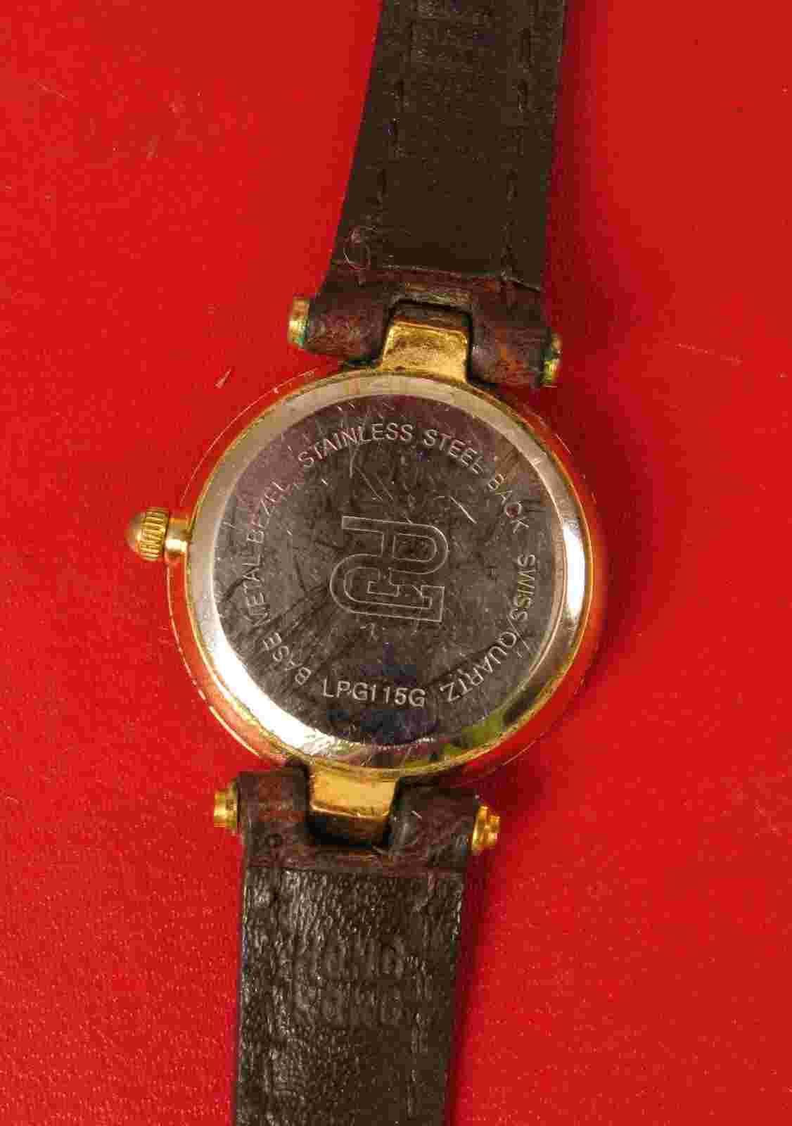 VINTAGE PAOLO WOMENS GOLD TONE CLASSY WATCH DESIGNED BY GUCCI NOT WORKING !!