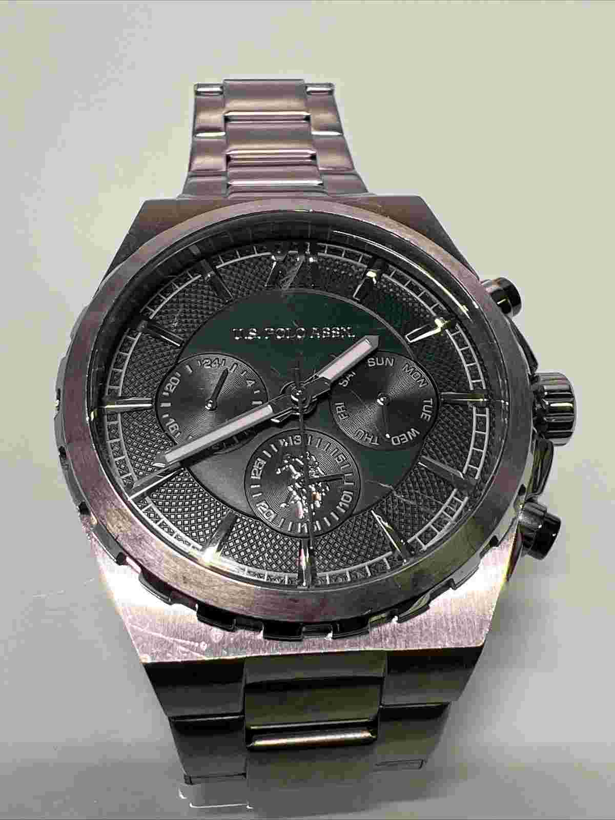 US Polo Assn Silver Tone Dial Round Case Two Tone Stainless Steel Band Watch.