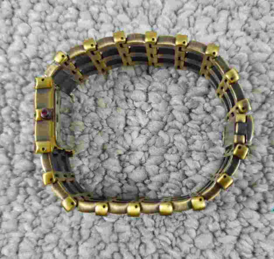 Heidi Daus Multigem Bracelet Watch B6900 Brass Measures 8" Battery