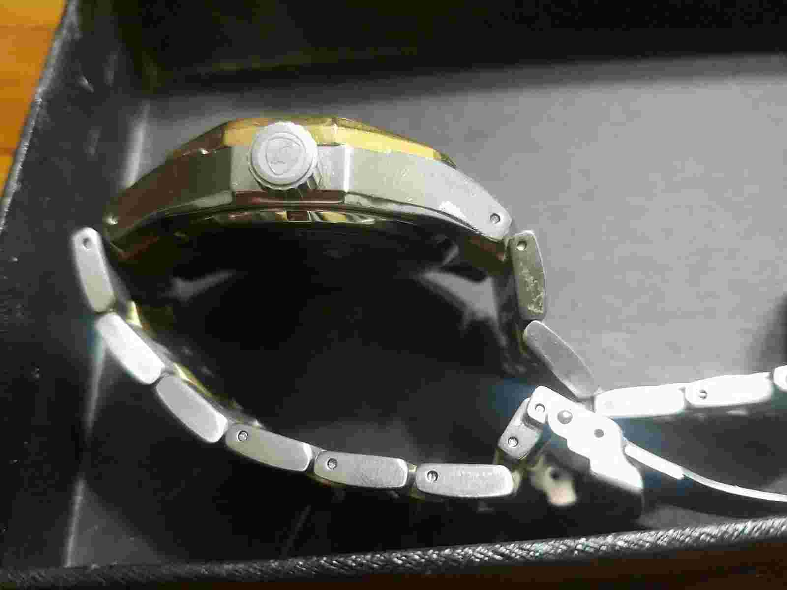 Tonino Lamborghini watch. Real gold and has its tags. Authentic.