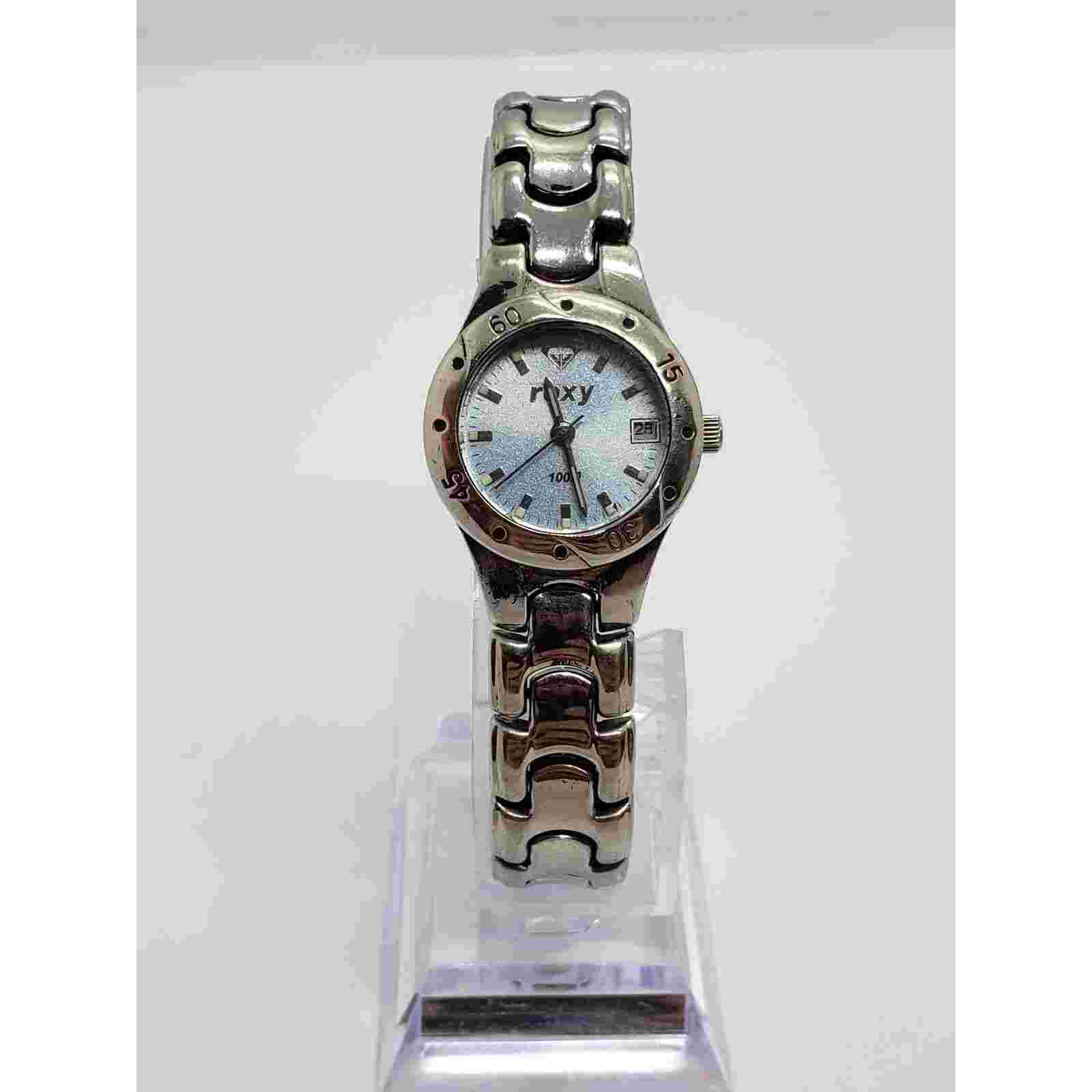 Roxy women's watch. Blue iridescent face. Calendar on watch face. working watch