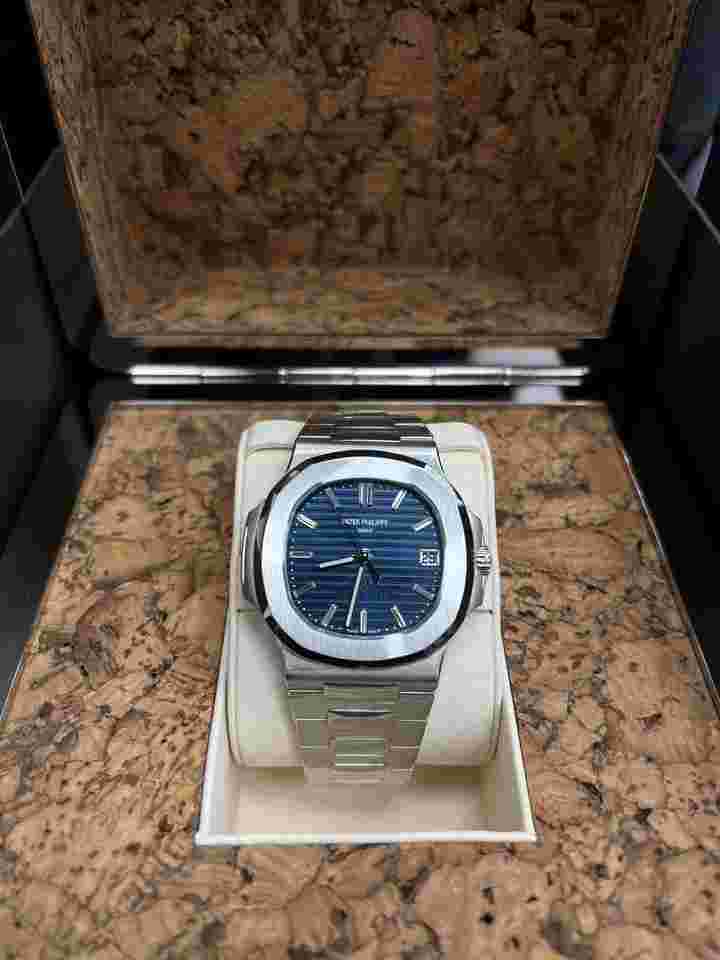 Patek Philippe Nautilus
5711/1P 40th Anniversary Platinum Baguette Blue Dial