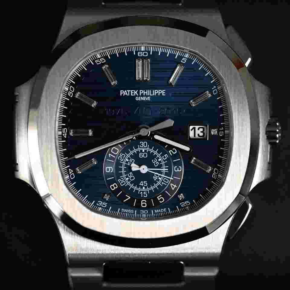 Patek Philippe Nautilus
5976/1G Chronograph 40th Anniversary White Gold Blue Dial Baguette Markers 44mm